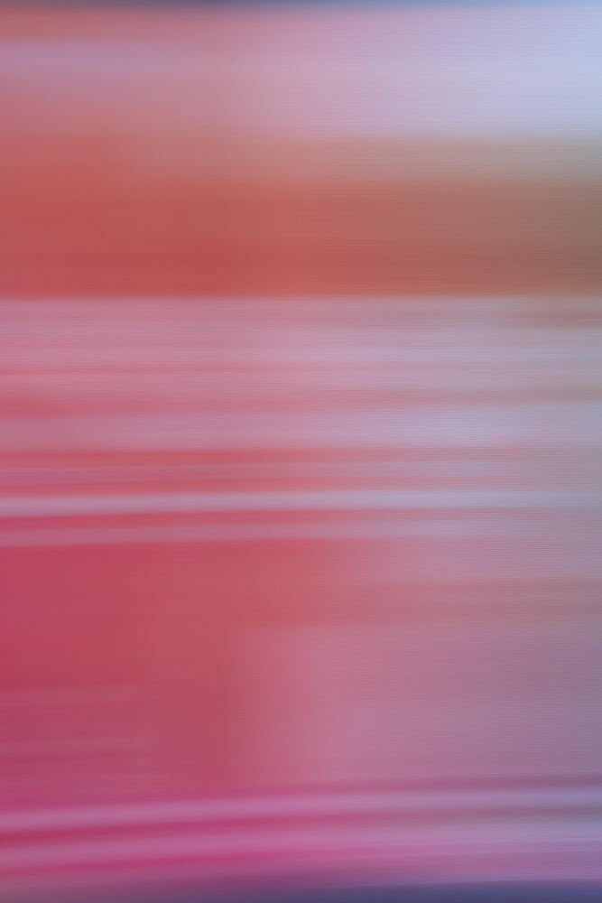 Abstract background with horizontal lines in shades of pink, red, and purple. The lines are blurred and create a soft, gradient effect.
