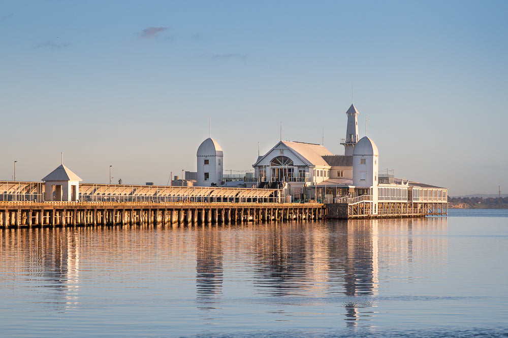 Cunningham pier architecture reflecting on calm Geelong Bay