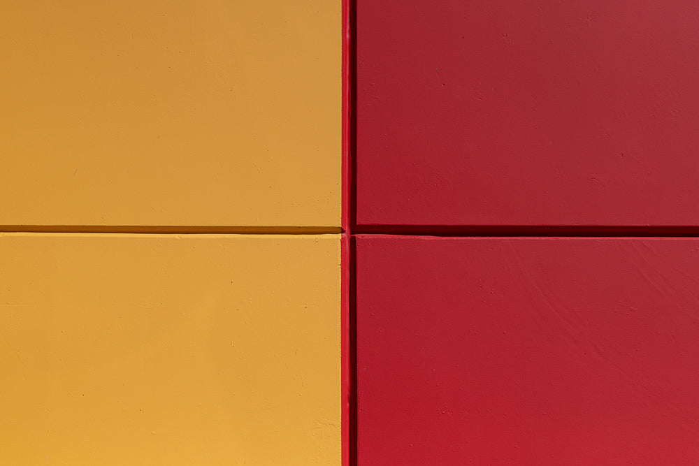Yellow and red geometric wall panels background