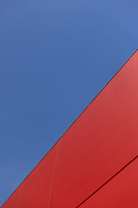 Abstract architecture with striking red and blue contrast