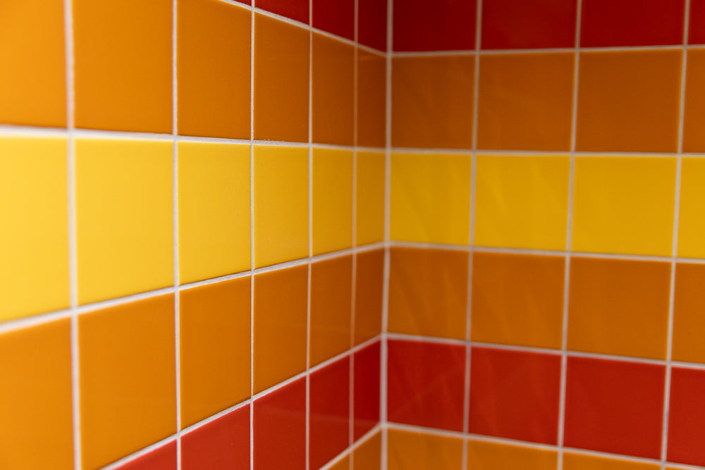 Colorful ceramic tiles creating a vibrant geometric pattern