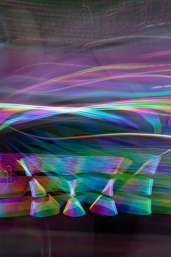 Colorful light trails creating abstract motion blur pattern