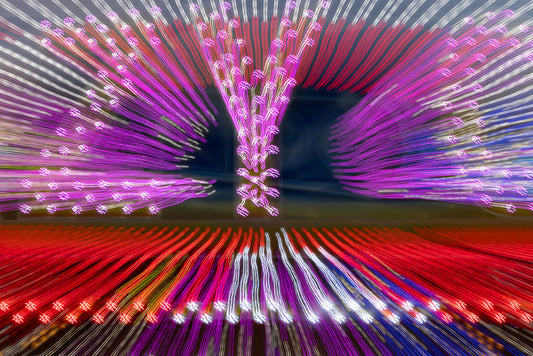 Abstract light trails creating speed and energy on dark background