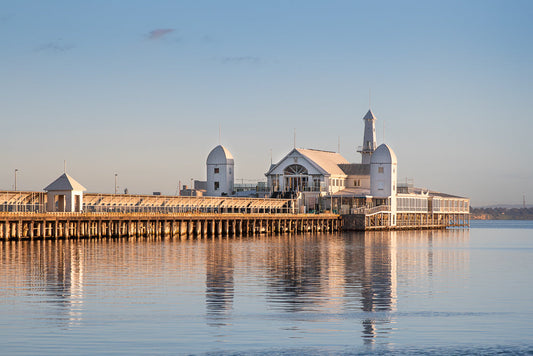 Cunningham pier architecture reflecting on calm Geelong Bay