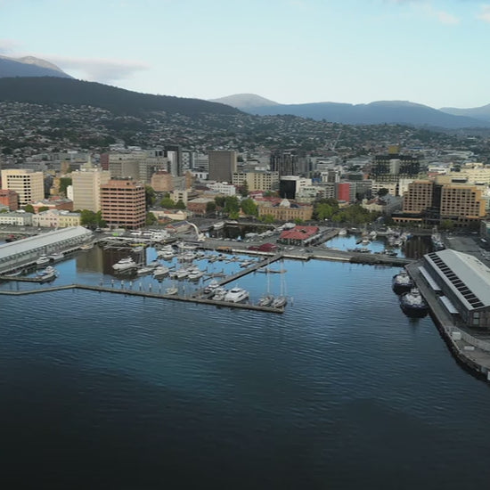 Aerial fly into Hobart Harbour in Tasmania during day