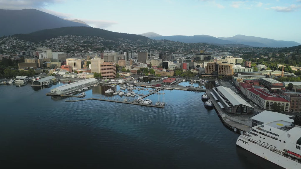 Aerial fly into Hobart Harbour in Tasmania during day