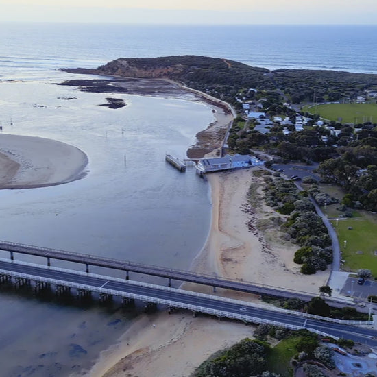 Barwon Heads River stretching towards Barwon Bluff aerial drone
