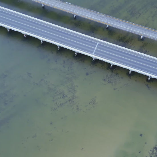 Top-down aerial view of Barwon Heads Bridge over Barwon River