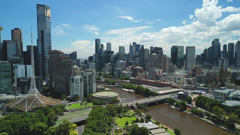 Aerial view Melbourne Skyline with the Yarra River and Spire - day