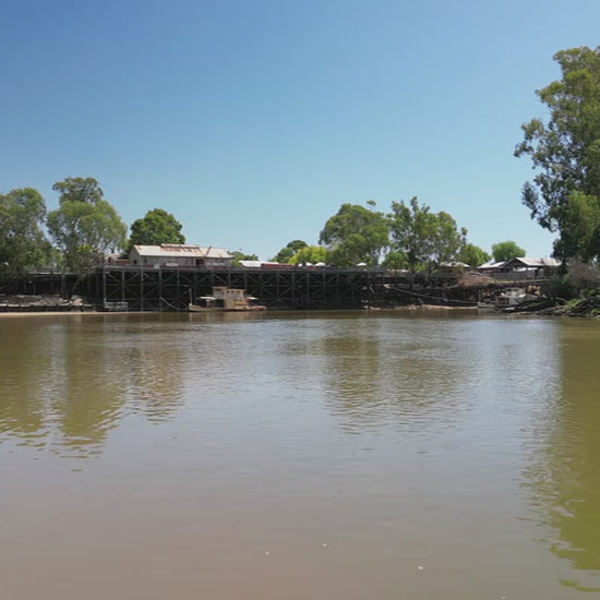 Drone travels along the Murray River towards Echuca Wharf. High quality 4k footage