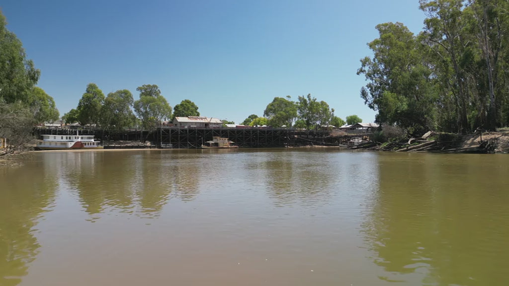 Drone travels along the Murray River towards Echuca Wharf. High quality 4k footage