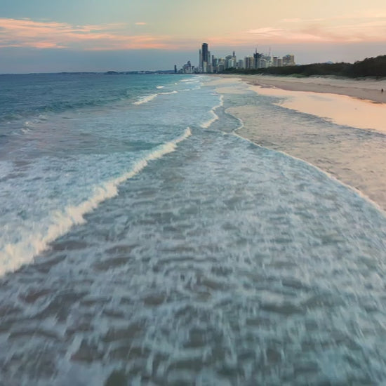 Aerial view of Gold Coast beach with Surfers Paradise skyline