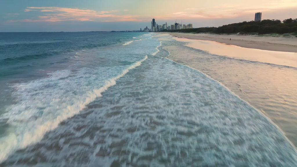 Aerial view of Gold Coast beach with Surfers Paradise skyline