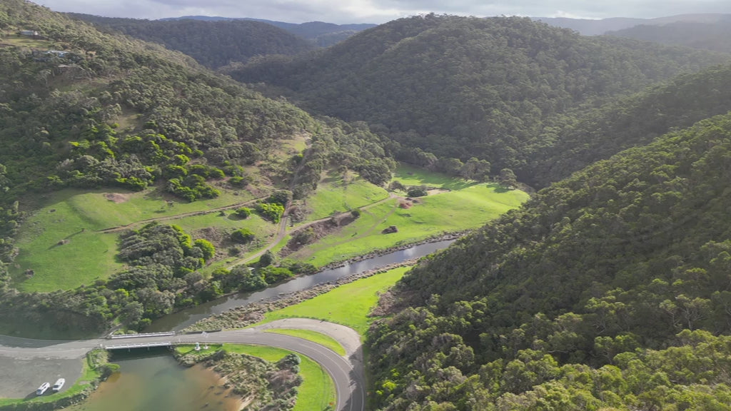 Great Ocean Road near Lorne. Aerial track along St George River to Otways Mountains. High-quality 4k footage