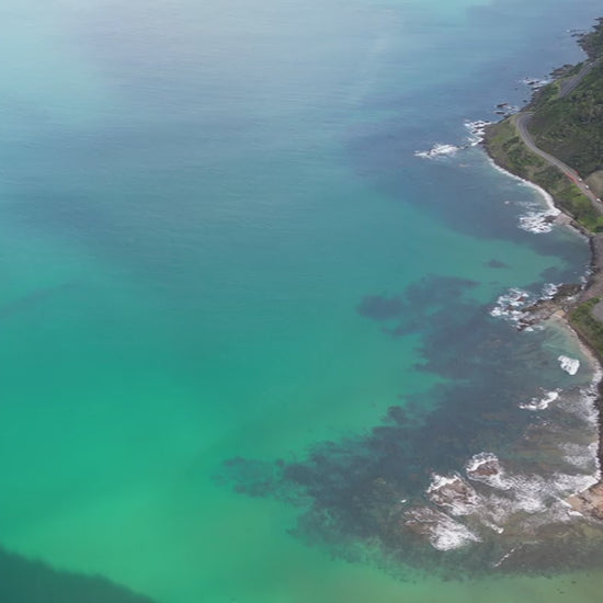 Aerial Lorne Scenic Beach - turquoise waters and winding coastal road