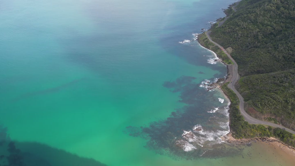Aerial Lorne Scenic Beach - turquoise waters and winding coastal road