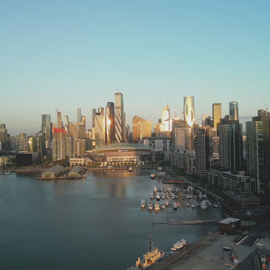 Aerial view of Melbourne city skyline and Docklands Marina at Sunse