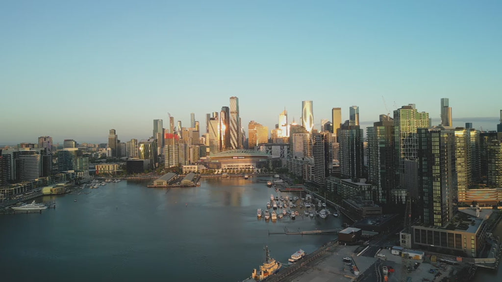 Aerial view of Melbourne city skyline and Docklands Marina at Sunse
