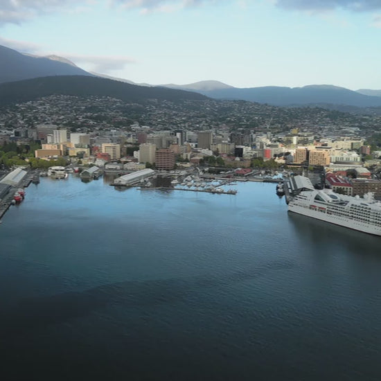 Fly over water to Hobart Harbour with Ship and view Mount Wellington