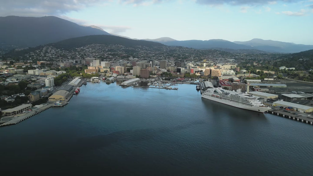 Fly over water to Hobart Harbour with Ship and view Mount Wellington